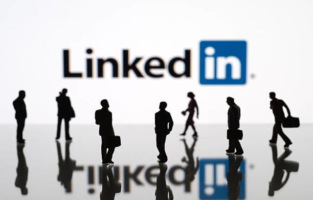 Linkedin logo with some people shown abstract